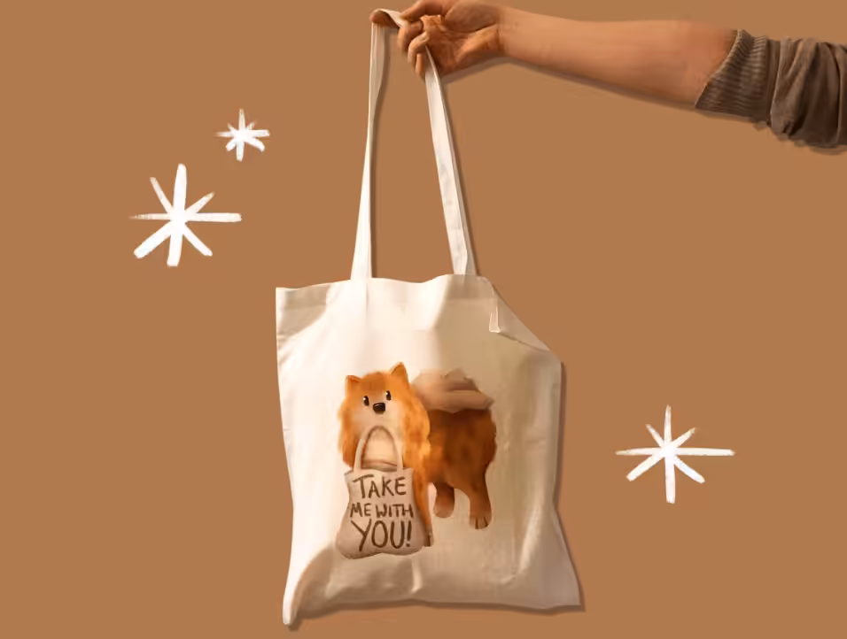 Before photography makeover shot of Woof by Hollie - hand holding tote bag with dog illustration.