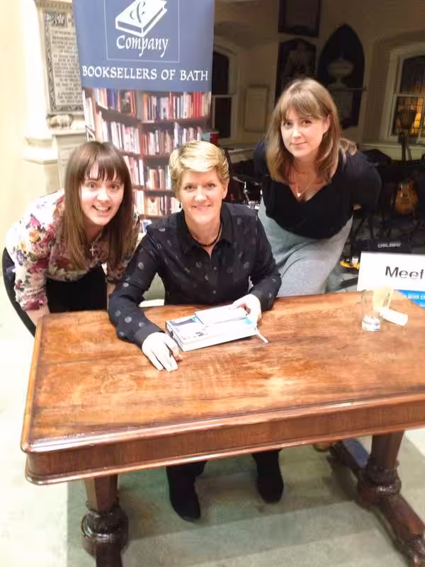 Aime, Kelly and Clare Balding smiling at a bookshop.