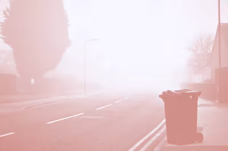 A bin on the side of the road.
