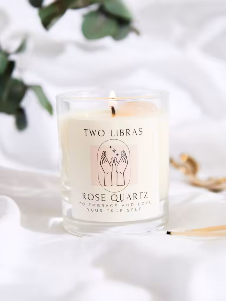 A Two Libras Rose Quartz Candle 