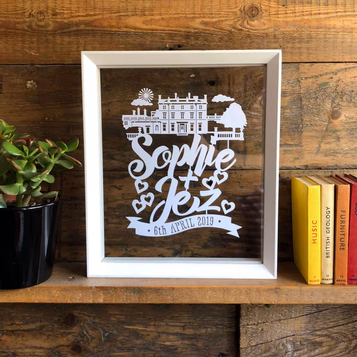 A personalised wedding papercut by Kyleigh's Papercuts.
