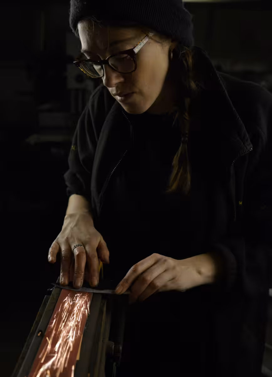Holly making a knife.