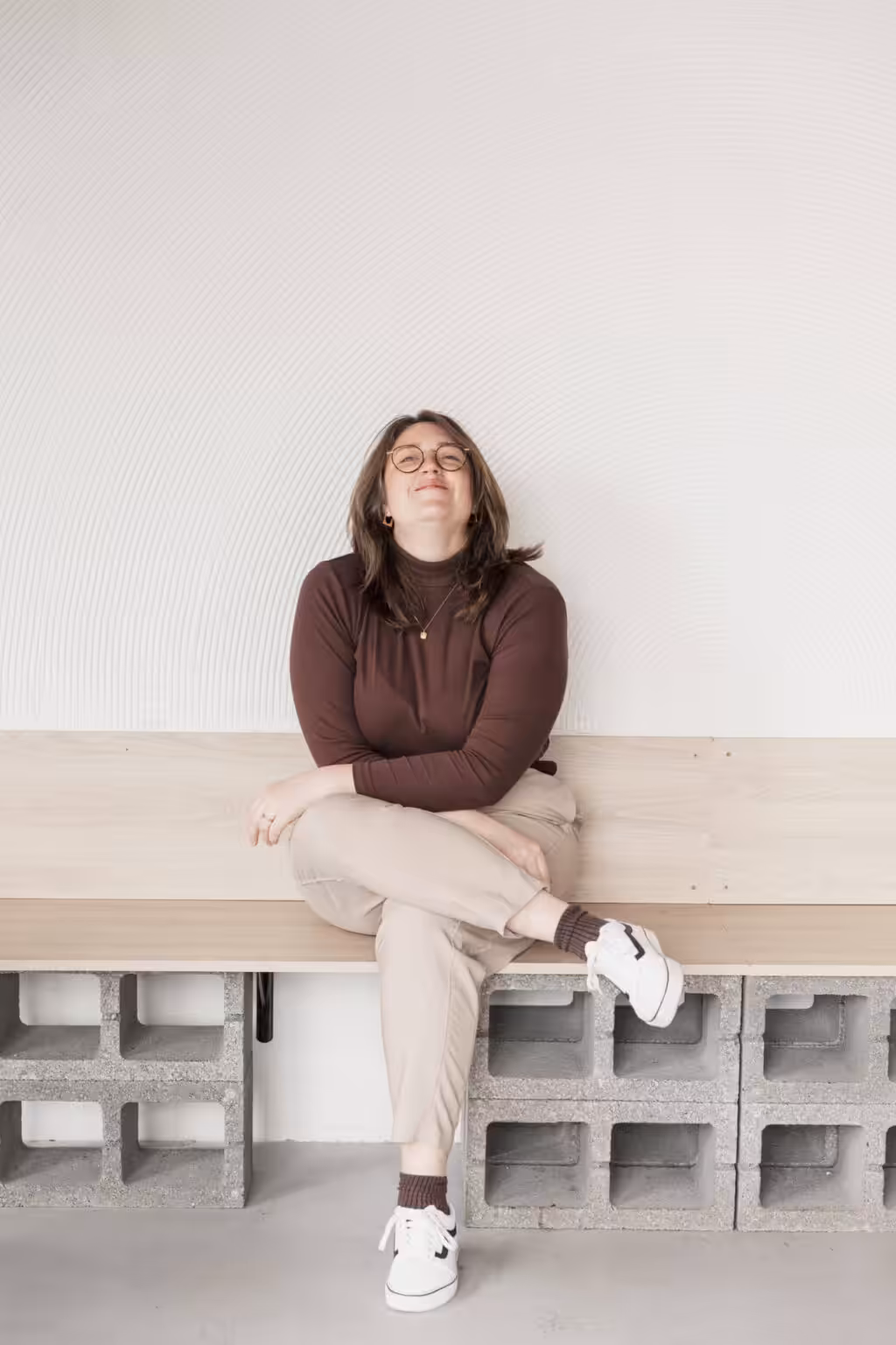 Studio Cotton founder Aime sat looking eager and pleased.