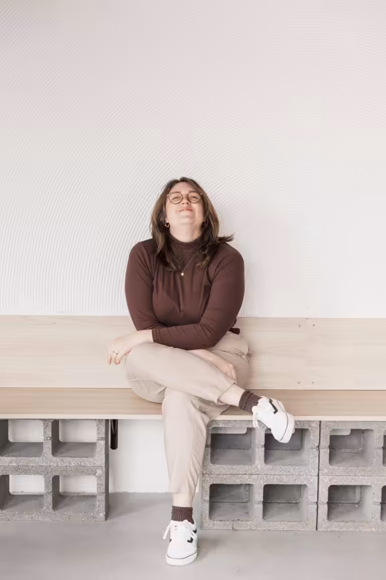 Studio Cotton founder Aime sat looking eager and pleased.