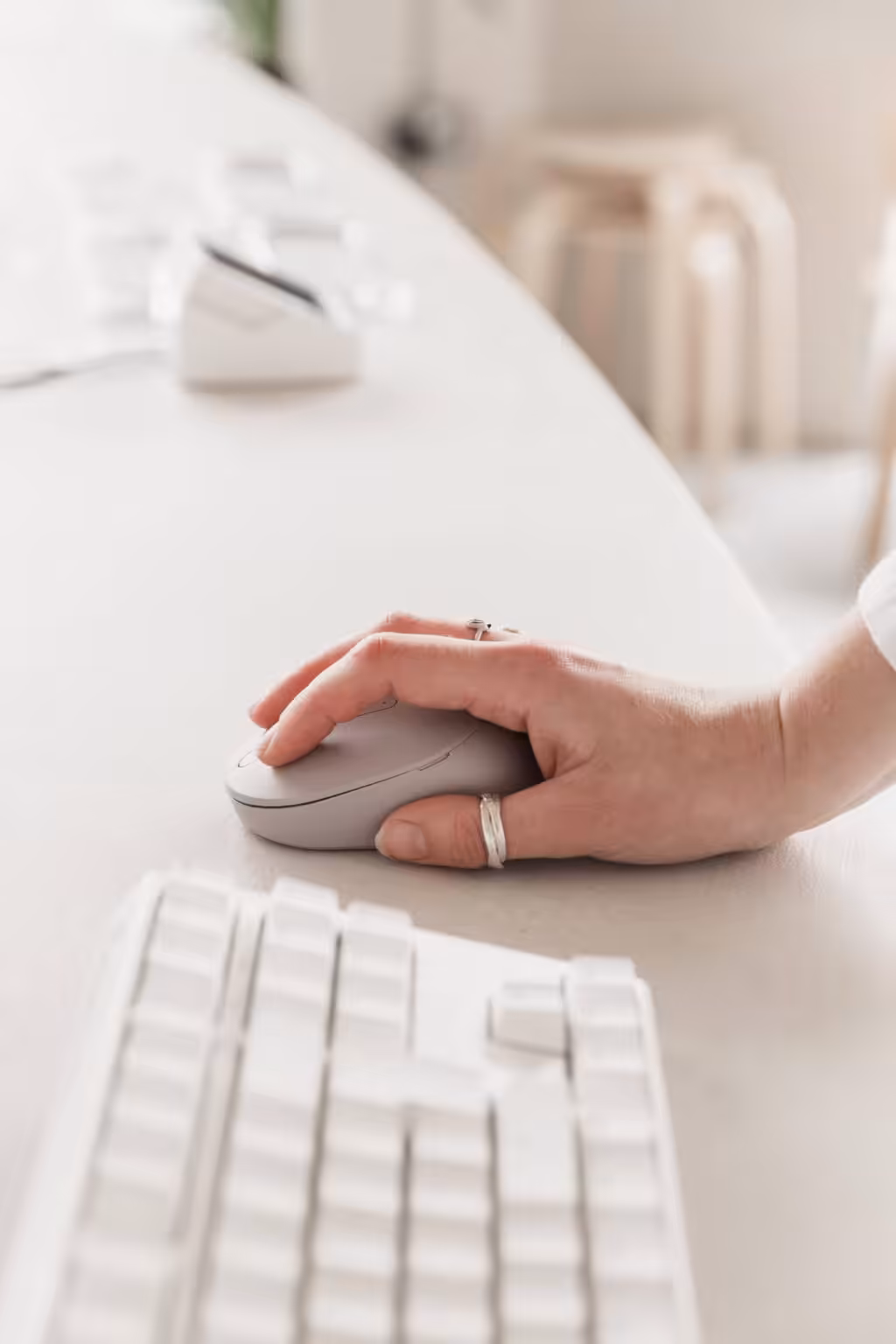 Hands using a mouse.
