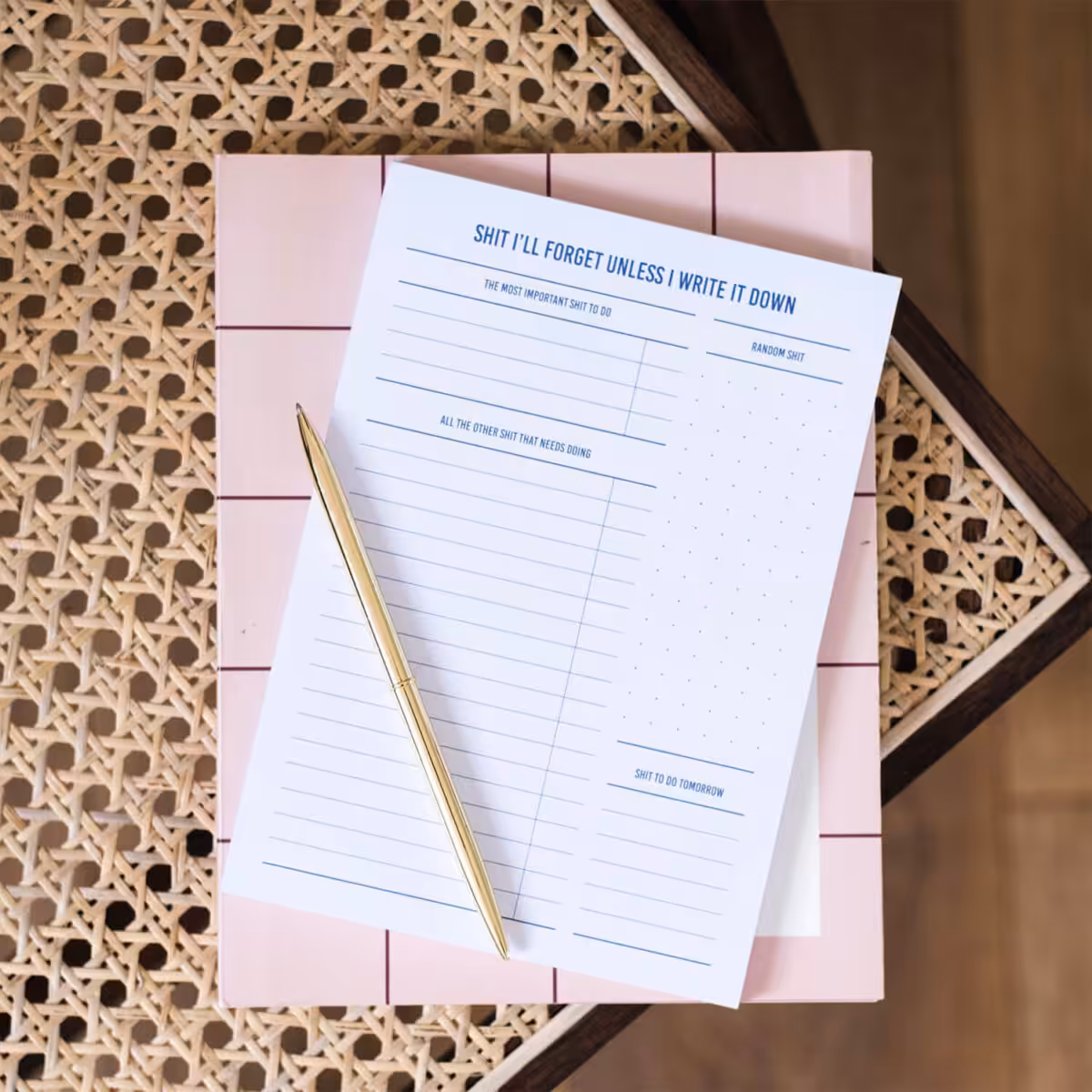 Sh*t I'll Forget A5 Desk Pad with blue ink on white, with gold pen