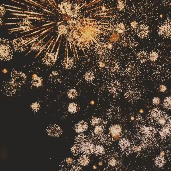 Gold fireworks on black
